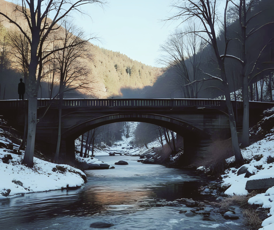 winter scene with large bridge over stream